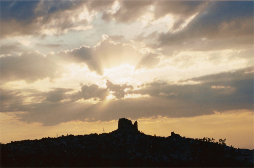 Sunset behind Uçhisar Castle 
