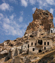 View of Ortahisar Castle with the deserted Village underneath in Cappadocia, Turkey